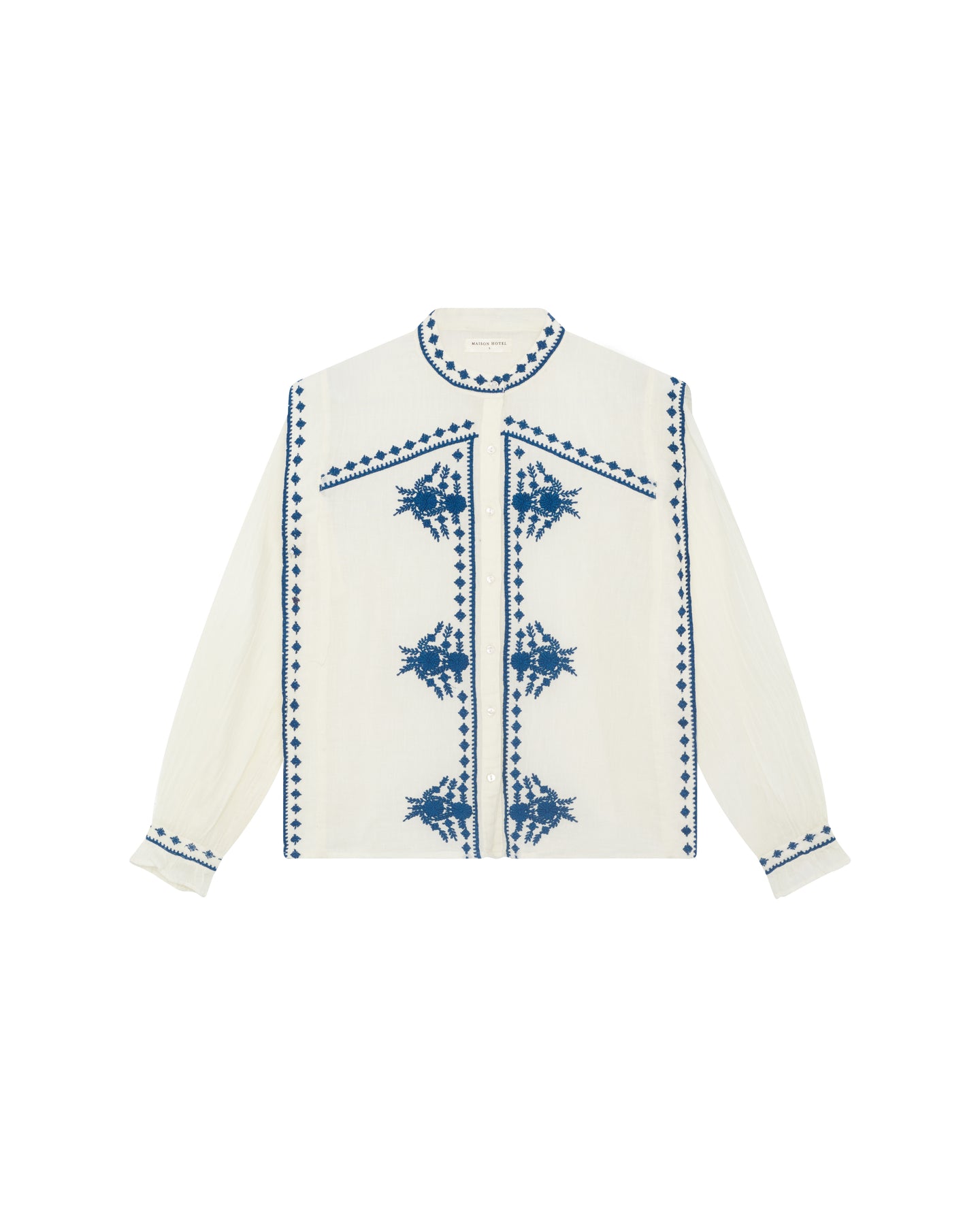 Maison Hotel White shirt with blue embroidered patterns on a white background