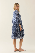 Load image into Gallery viewer, Woman wearing a blue floral dress Isle Of Mine Wilma Dress Navy 